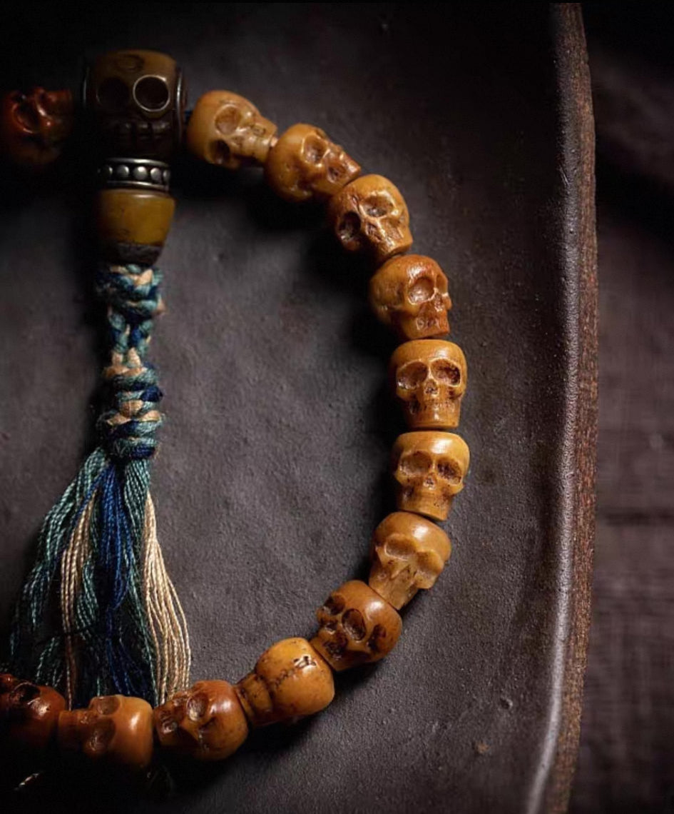 Handcrafted Yak Bone Skull Mala Bracelet: Tibetan Prayer Beads