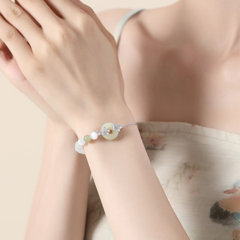 EverestArtstudios 999 Sterling Silver Natural Hetian Jade Peace Buckle Peach Blossom Luck Bracelet
