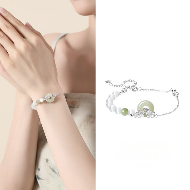 EverestArtstudios 999 Sterling Silver Natural Hetian Jade Peace Buckle Peach Blossom Luck Bracelet