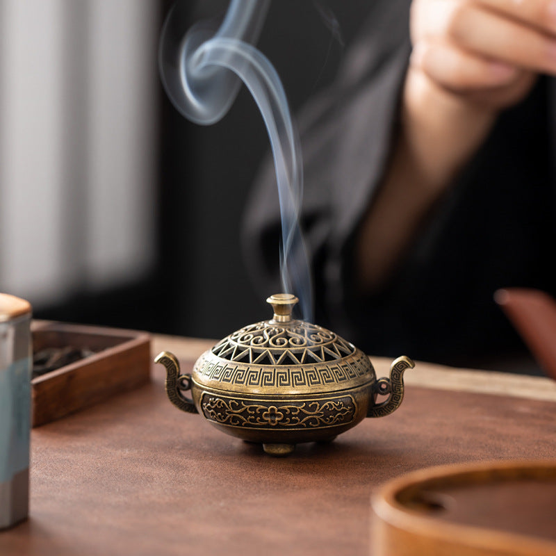 Binaural antique incense burner exquisite pattern hollow three-legged burner household indoor Xuande burner plate incense burner desktop ornament