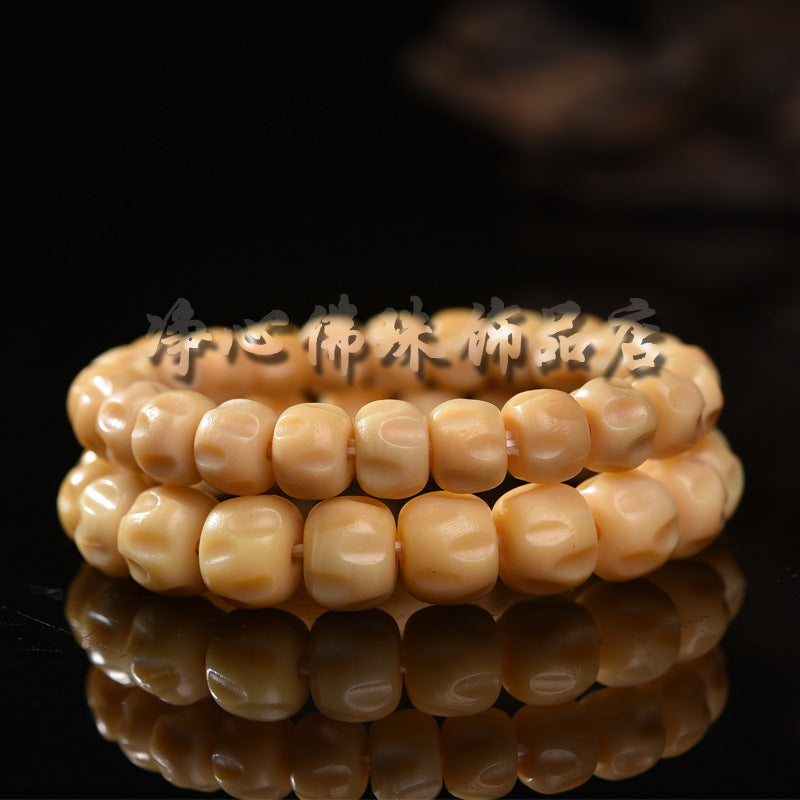EverestArtstudios 駱駝骨暖米色鼓珠手串