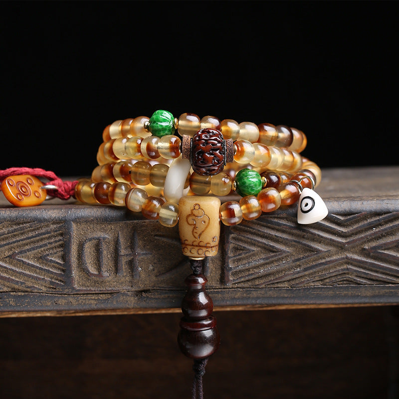 EverestArtstudios Golden Armor Barrel-Bead Mala with Vajra Bodhi and Horn Accents