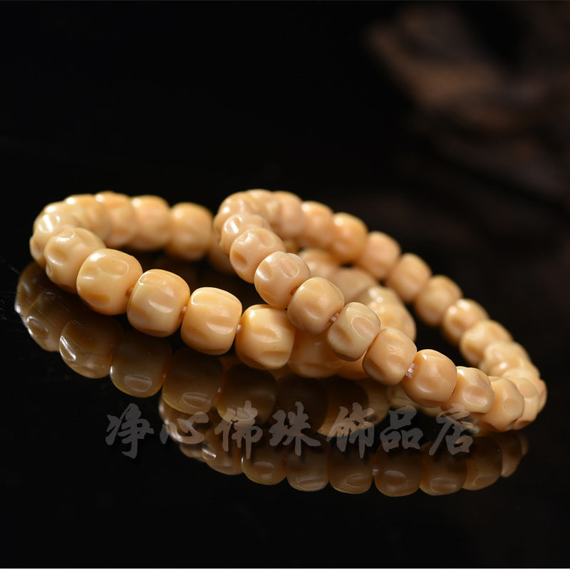 EverestArtstudios 駱駝骨暖米色鼓珠手串