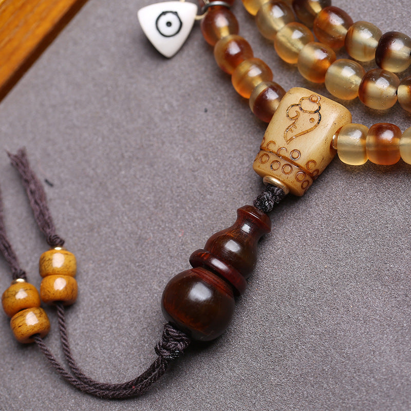 EverestArtstudios Golden Armor Barrel-Bead Mala with Vajra Bodhi and Horn Accents