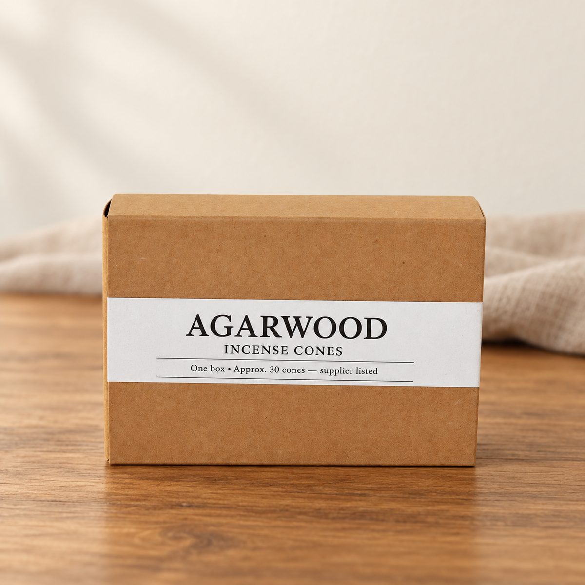 Agarwood incense cones in the original brown paper box