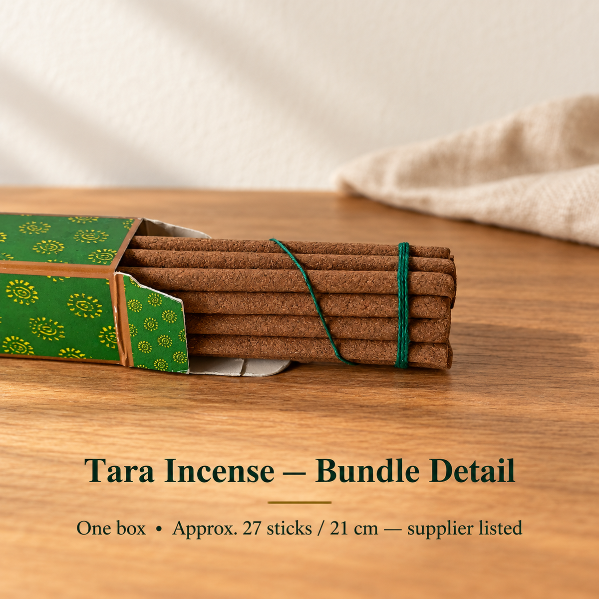 Tara Incense — actual coreless bundle tied with green string emerging from its long green-and-gold box