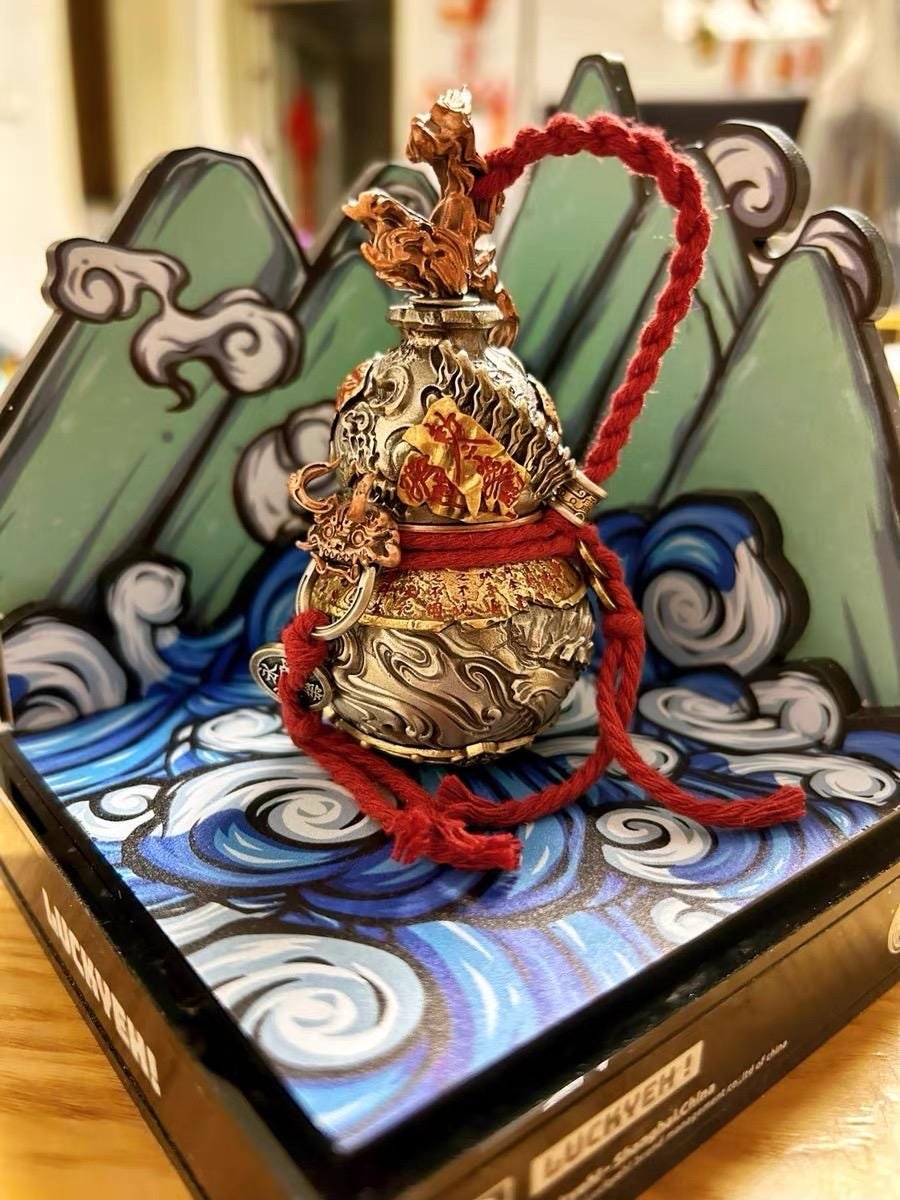 SWORD GOURD ORNAMENT — original source view 10; ORIGINAL GOLD-TONE SOURCE VIEW