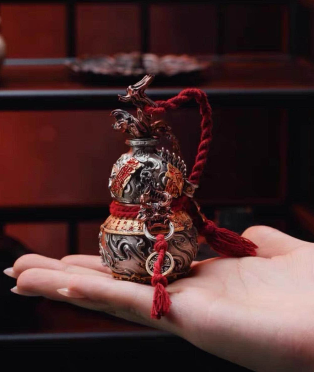 SWORD GOURD ORNAMENT — original source view 2; ORIGINAL HANDHELD PHOTOGRAPH