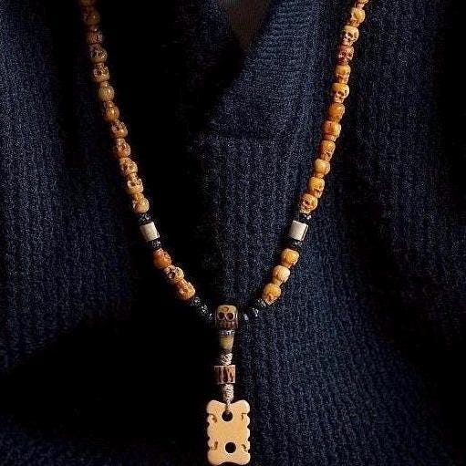 Handcrafted Tibetan Skull Shape Yak Bone Mala Bracelet, 108 Beads Buddhist Prayer Beads for Meditation, Yoga, and Spiritual Healing