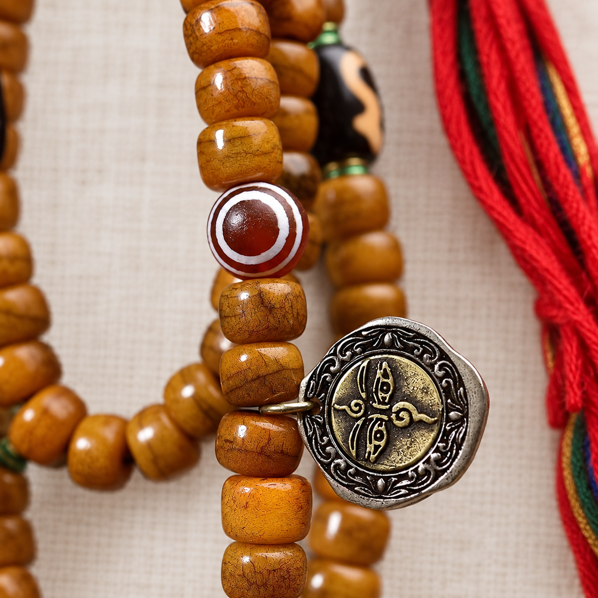 EverestArtstudios Tibetan Vintage Camel Bone Barrel-Bead 108-Bead Mala Wrap Bracelet — charm detail