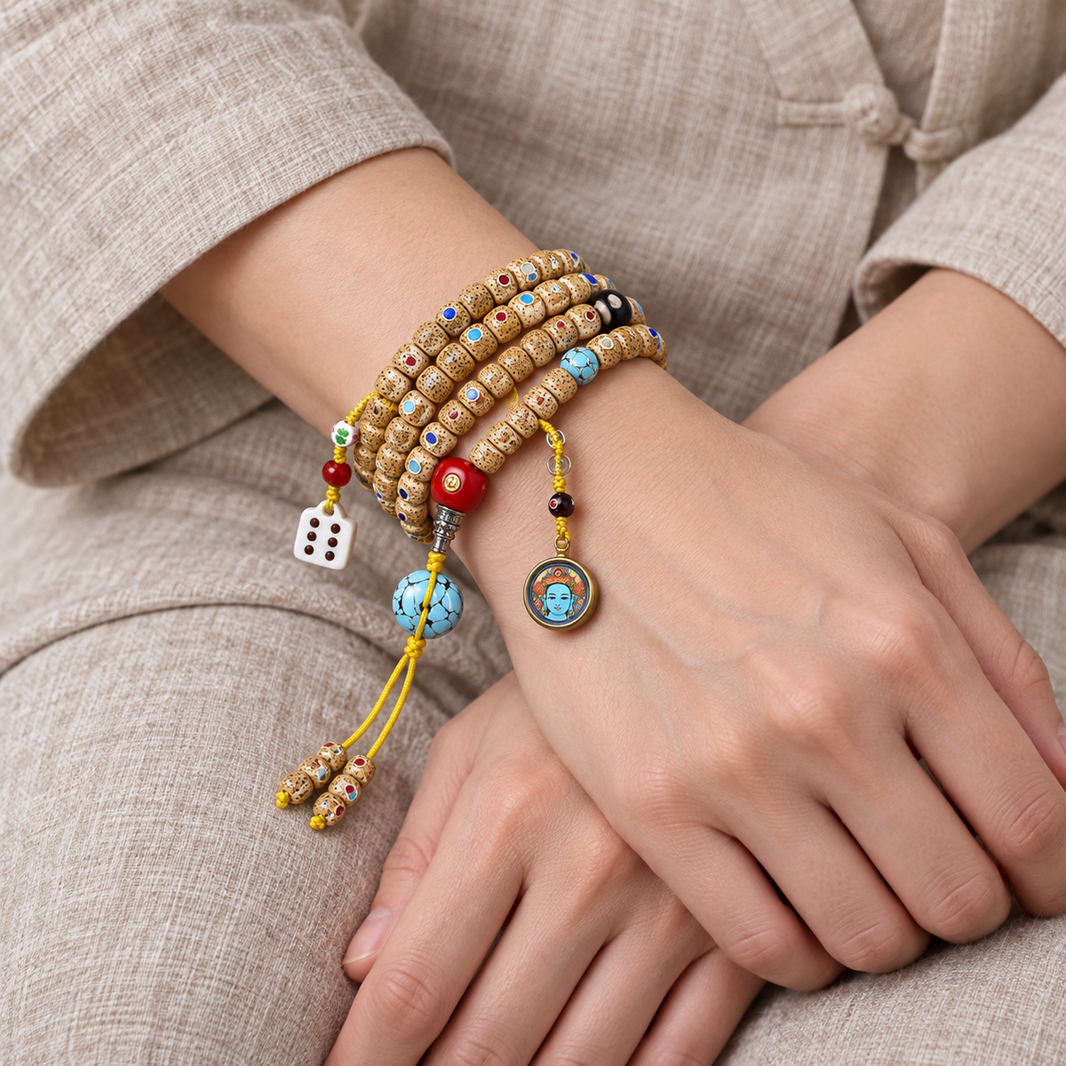 Inlaid Xingyue Bodhi 108-bead mala — wrist crossed