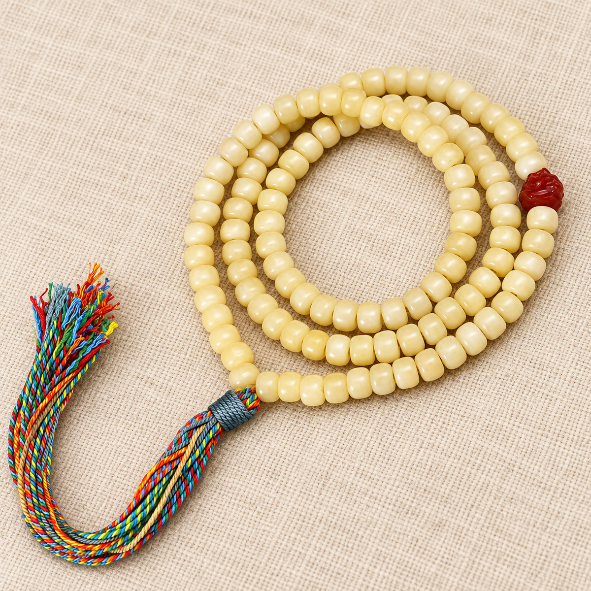 Golden white camel bone Tibetan mala — pendant detail