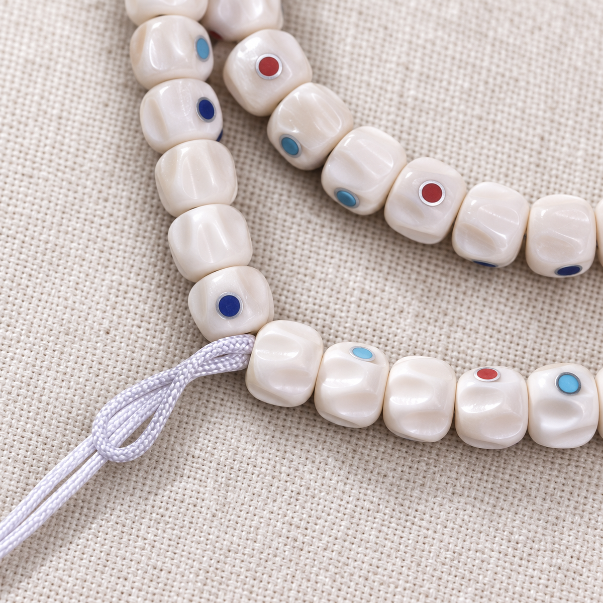 Tibetan mala DIY bead strand — cord detail