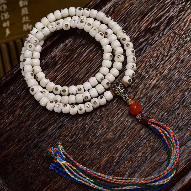 EverestArtstudios Natural Yak Bone Antique Copper Auspicious Wan 108-Bead Mala — overall display