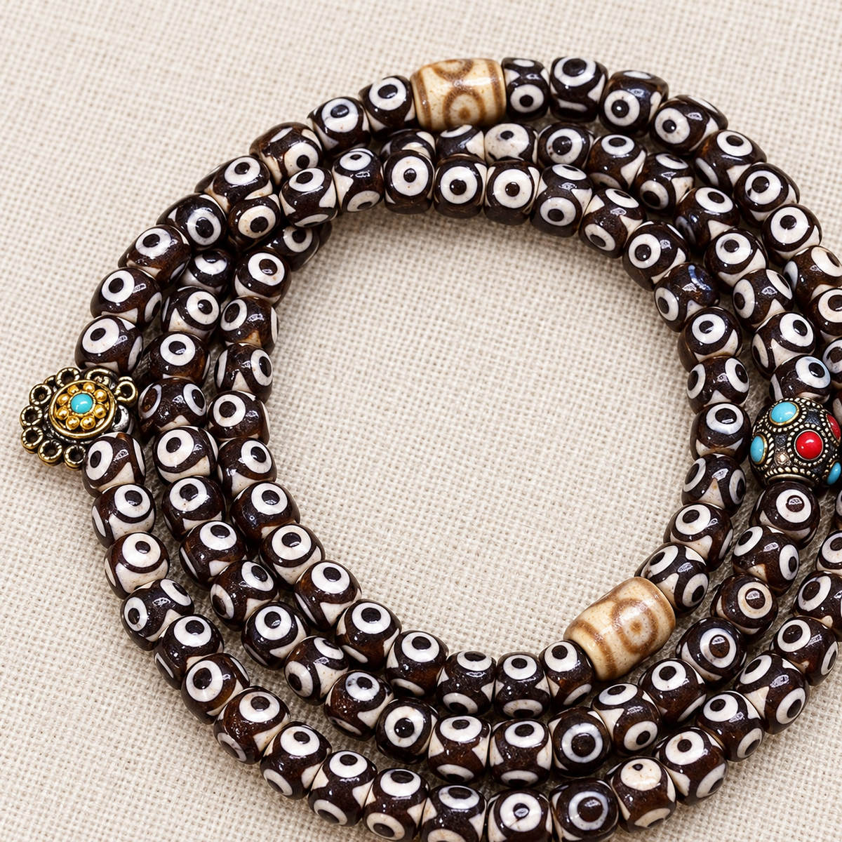 EverestArtstudios Natural Three-Eye Dzi and Red Agate 108-Bead Tibetan Mala — bead detail