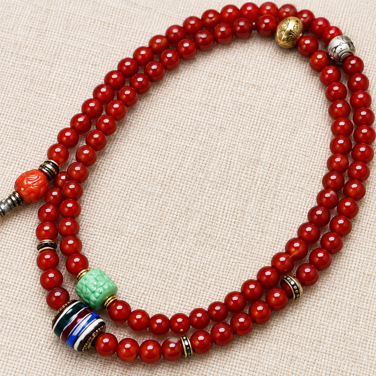 EverestArtstudios Red Agate 108-Bead Mala with Ksitigarbha Pendant — bead detail