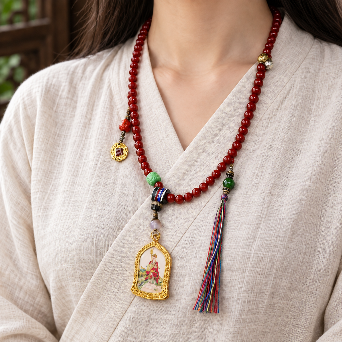 EverestArtstudios Red Agate 108-Bead Mala with Ksitigarbha Pendant — linen side