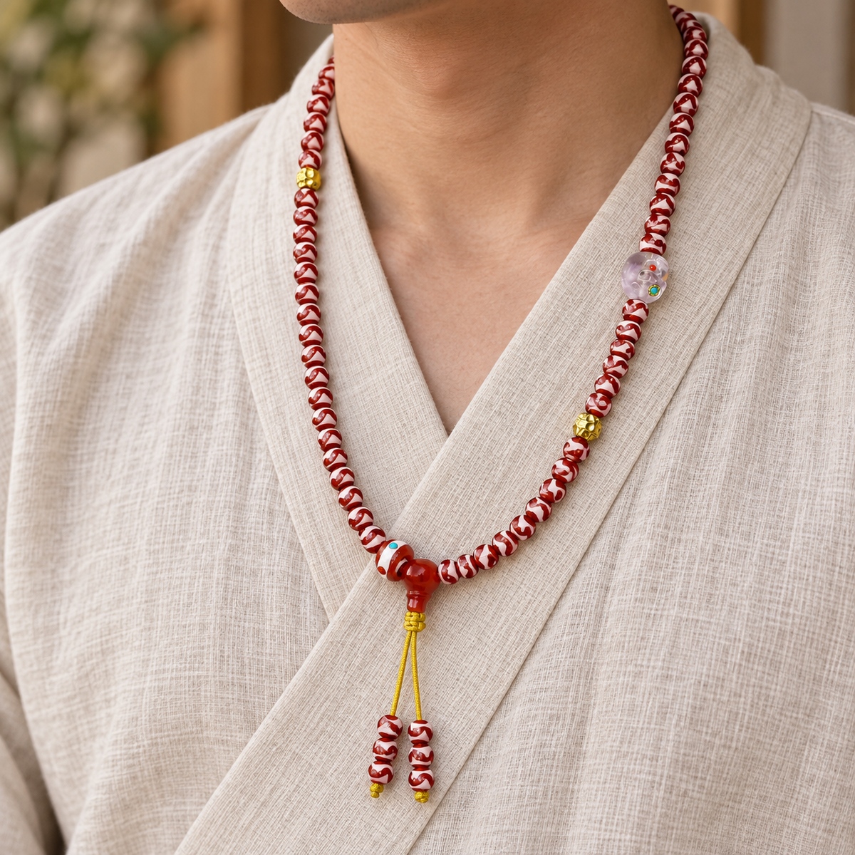 Tiger-Tooth Dzi and Amethyst Mala — linen side
