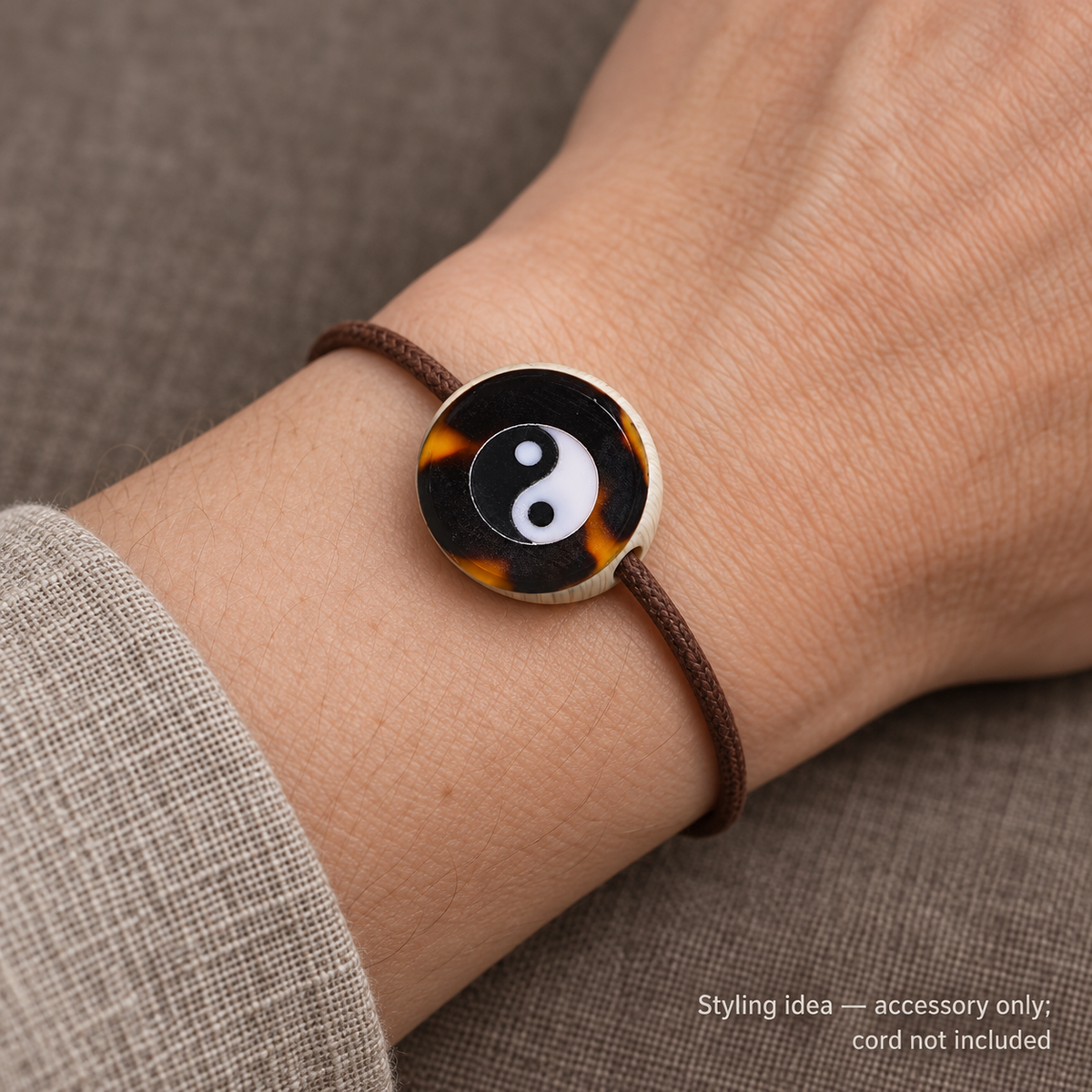 Bagua Drum Mala Accessory — wrist resting