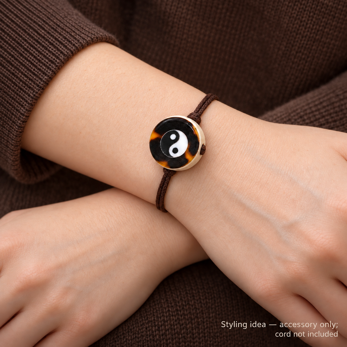 Bagua Drum Mala Accessory — wrist crossed