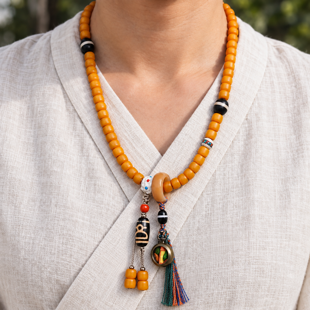 Golden-yellow camel bone 108-bead mala — linen front