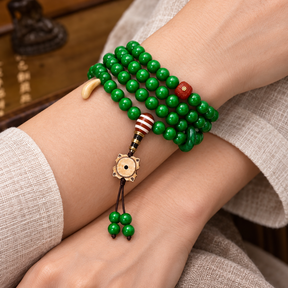 EverestArtstudios Tibetan Horn-Look 108-Bead Mala with Agate and Bone Accents — wrist crossed