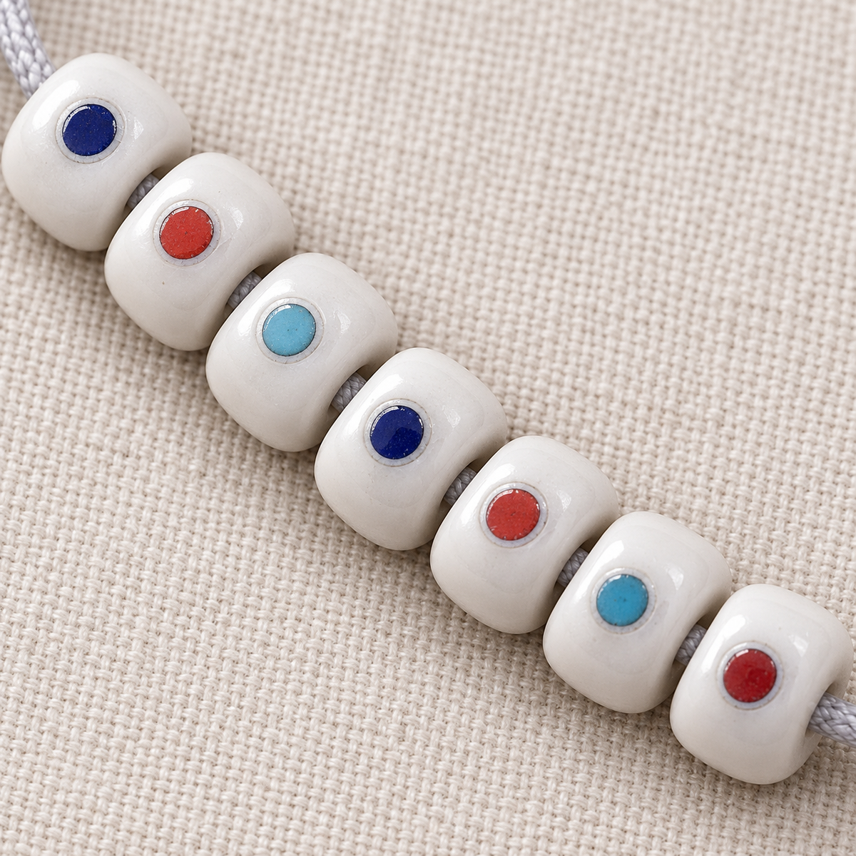 EverestArtstudios Camel Bone Inlaid Multi-Treasure or Auspicious Wan 108-Bead DIY Strand — bead detail