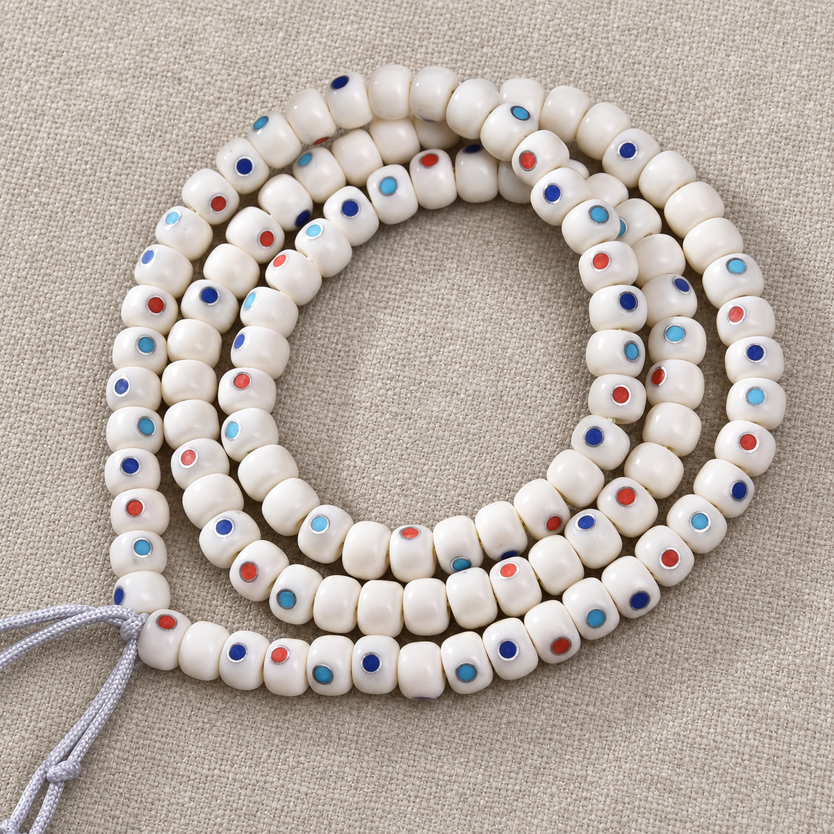 EverestArtstudios Camel Bone Inlaid Multi-Treasure or Auspicious Wan 108-Bead DIY Strand — cord detail