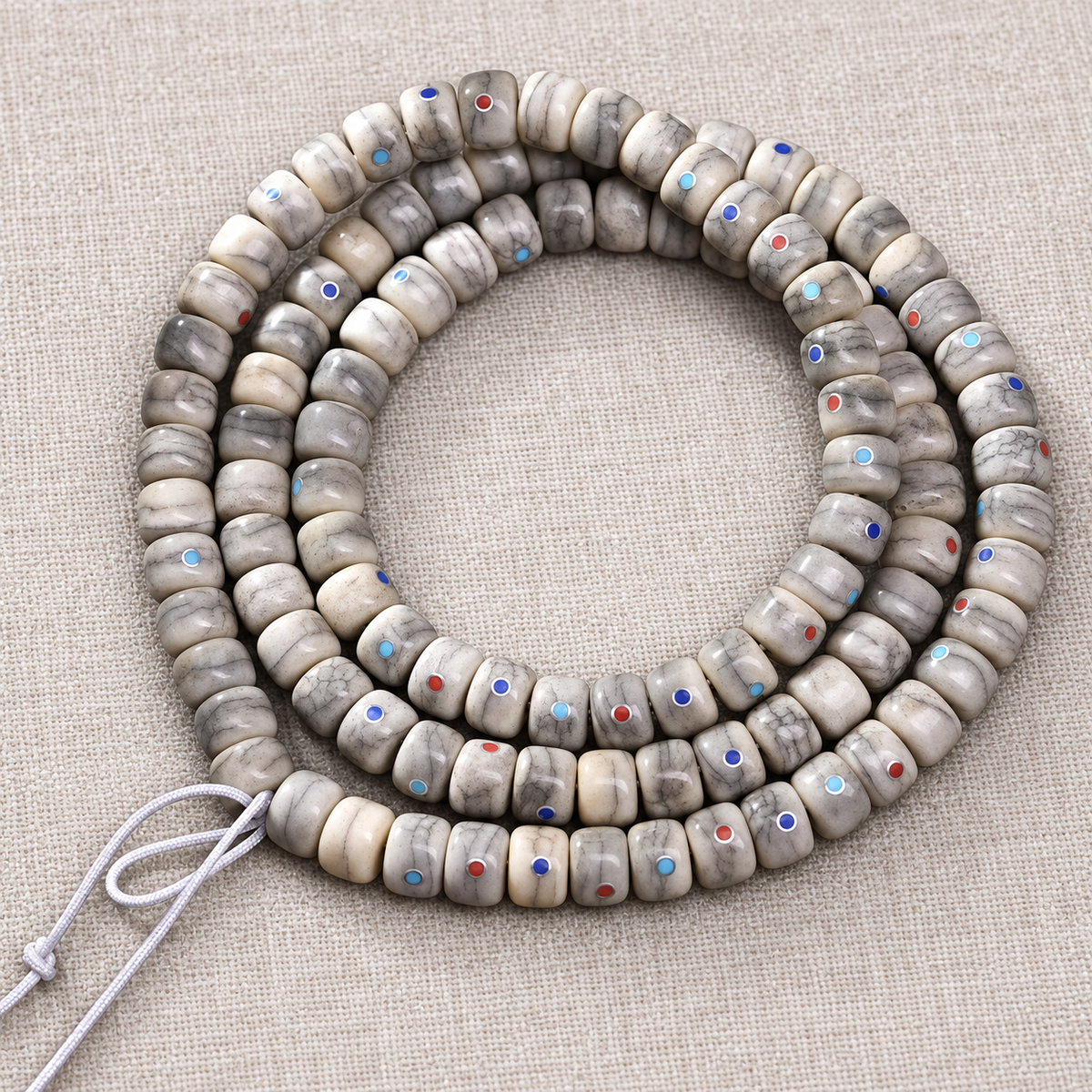 EverestArtstudios Aged Camel Bone Inlaid Multi-Treasure 108-Bead DIY Strand — cord detail