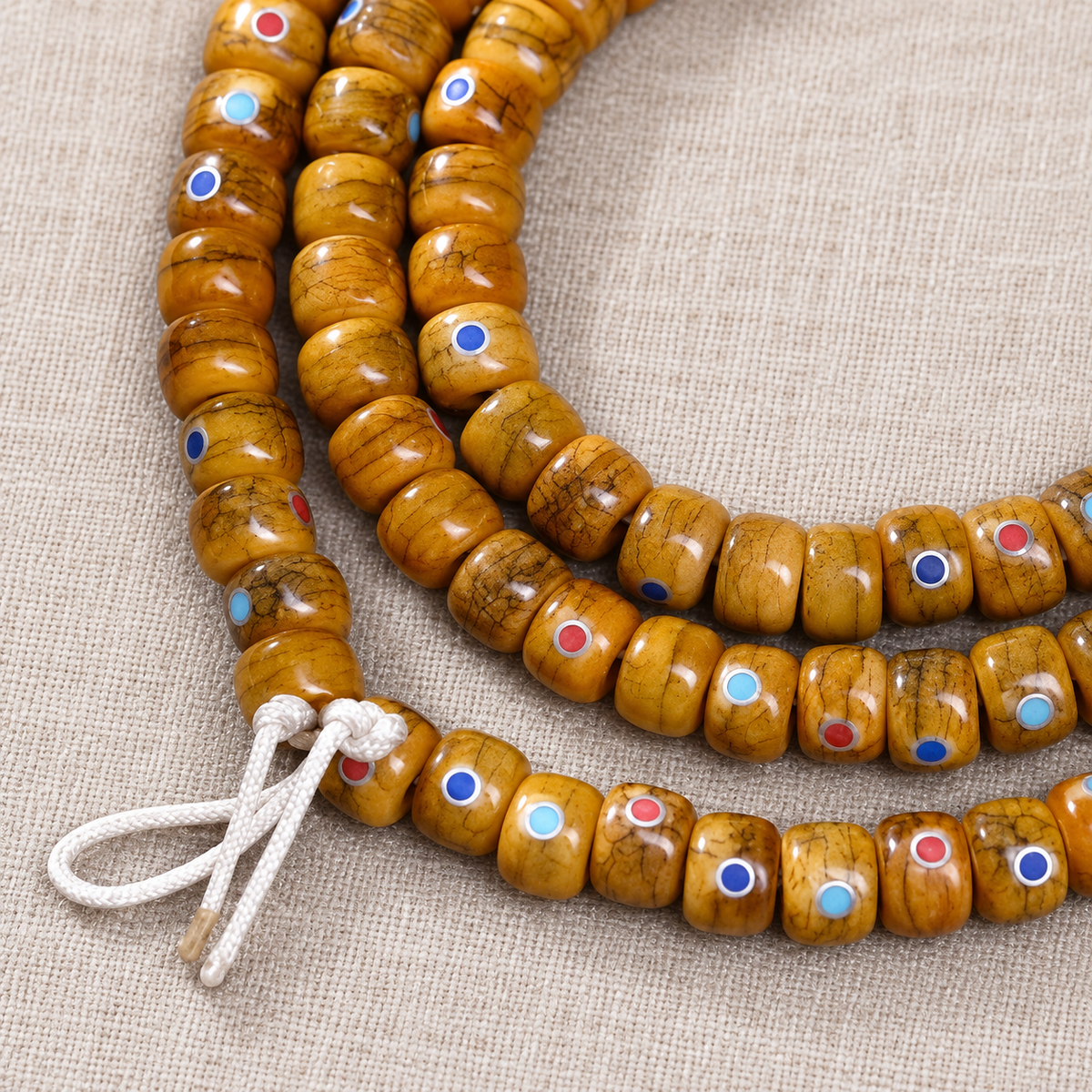 EverestArtstudios Aged Yak and Camel Bone Inlaid 108-Bead DIY Strand — cord detail