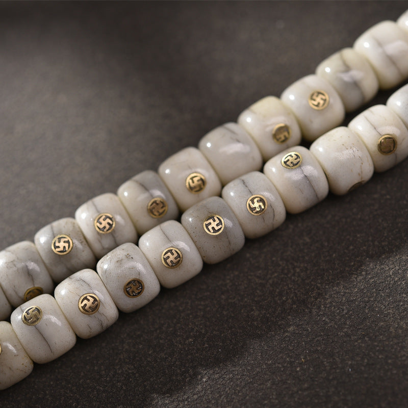 EverestArtstudios Aged Camel Bone Antique Copper Auspicious Wan 108-Bead DIY Strand — surface detail