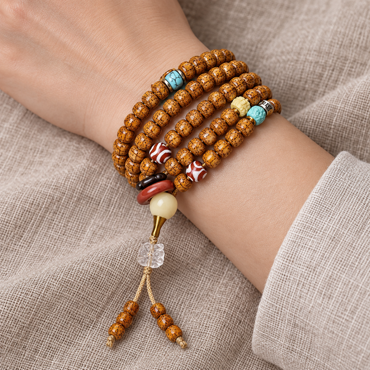 EverestArtstudios Natural Hainan Xingyue Bodhi Red Agate Turquoise 108-Bead Mala — wrist resting