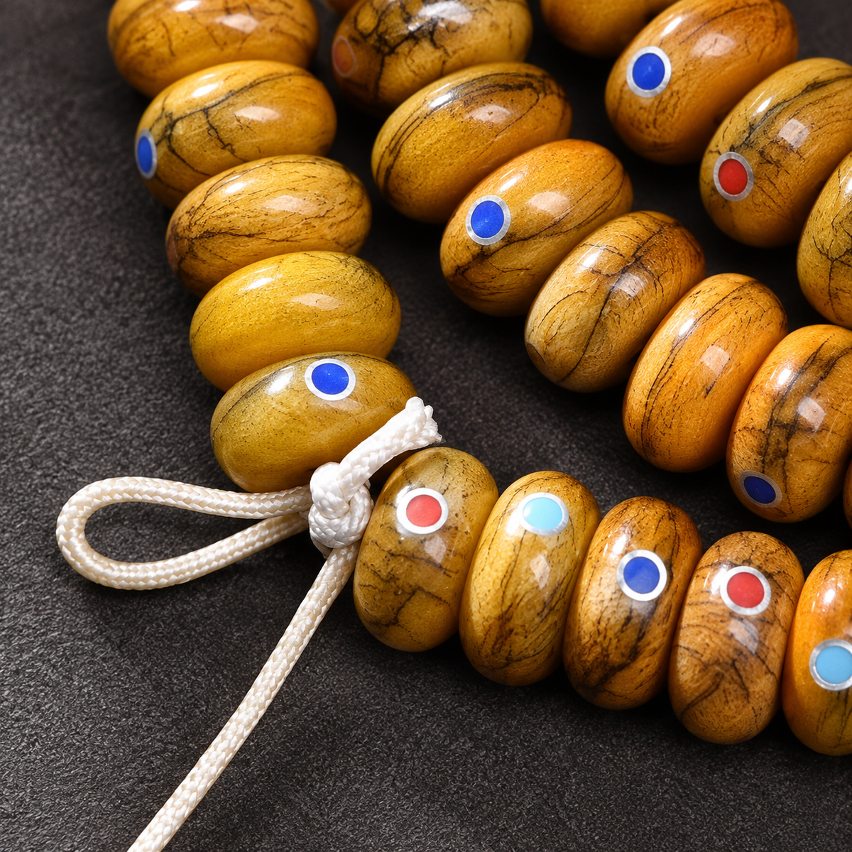 EverestArtstudios Aged Camel Bone Inlaid Abacus-Bead 108-Bead DIY Strand — connection detail