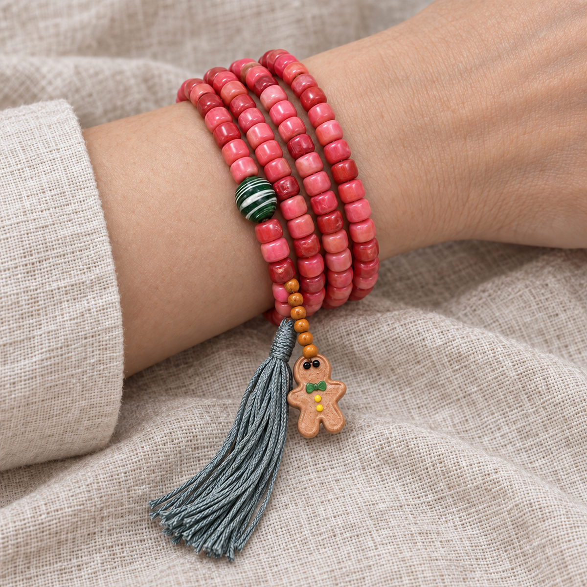 EverestArtstudios Natural Full-Blood Camel Bone 108-Bead Mala with Gingerbread Charm — wrist resting