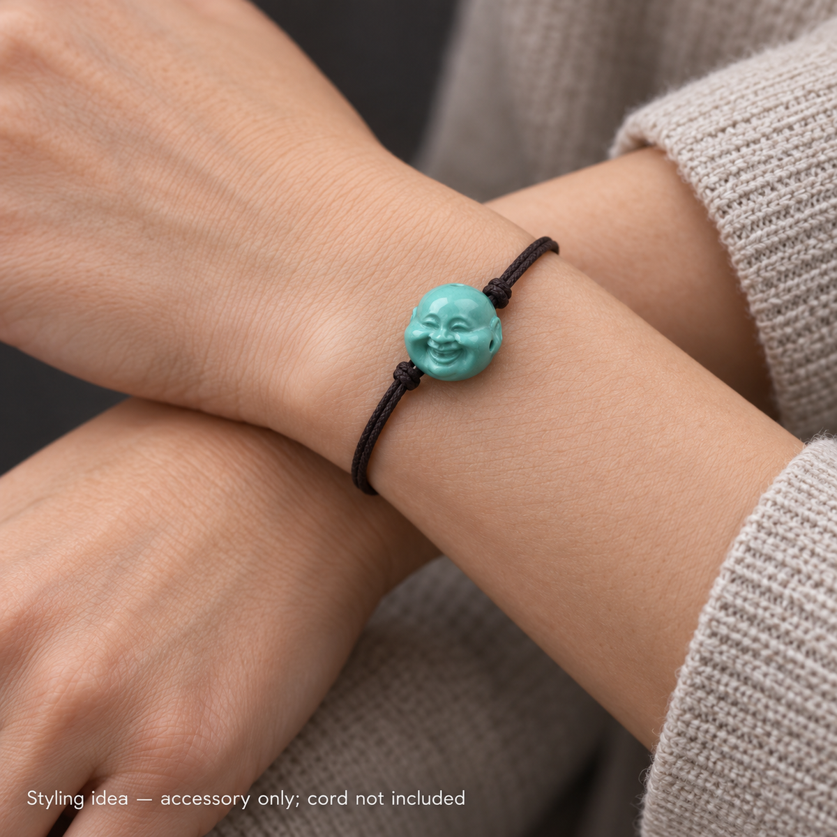 EverestArtstudios Hand-Carved Turquoise Buddha Head Mala Accessory — wrist crossed