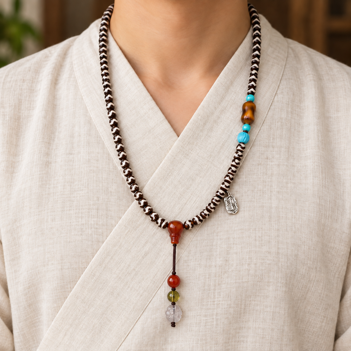 EverestArtstudios Natural Agate Tiger-Tooth Dzi 108-Bead Mala with Red Agate and Clear Quartz — linen front