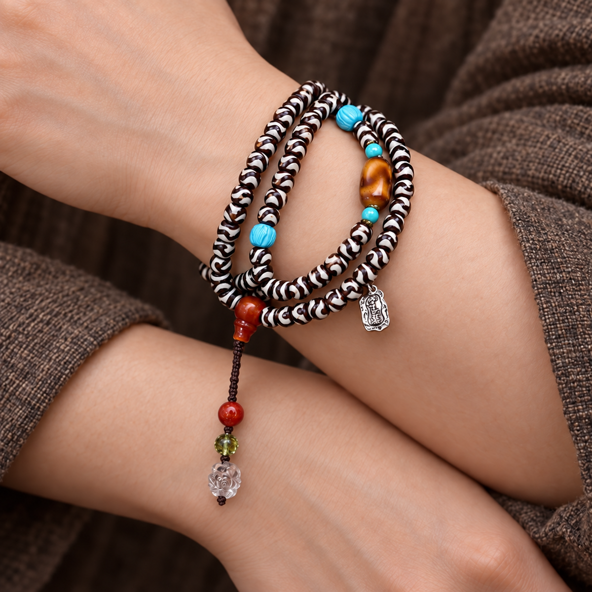 EverestArtstudios Natural Agate Tiger-Tooth Dzi 108-Bead Mala with Red Agate and Clear Quartz — wrist crossed