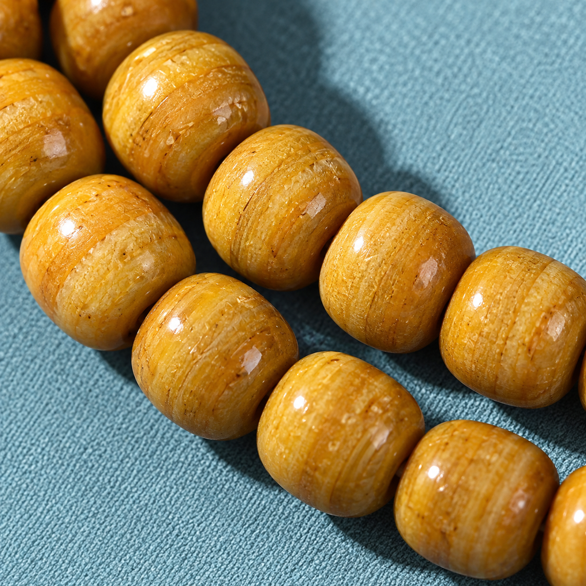 EverestArtstudios Natural Camel Bone 108-Bead Mala with Zaki Lhamo Gau Pendant — bead detail
