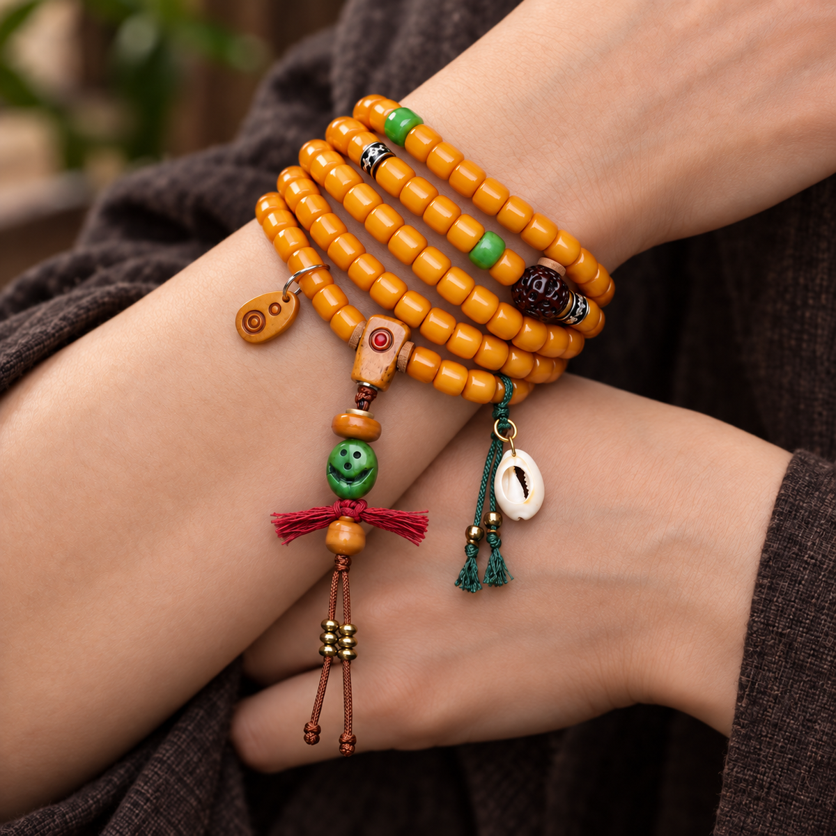 EverestArtstudios Yak Bone 108-Bead Mala with Vajra Bodhi and Camel Bone Accents — wrist crossed
