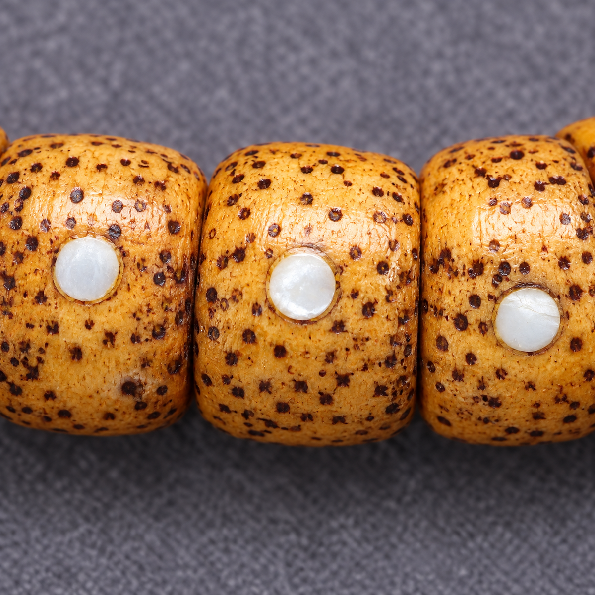 EverestArtstudios Xingyue Bodhi 108-Bead Mala with Yak Bone and Red Agate Accents — surface detail
