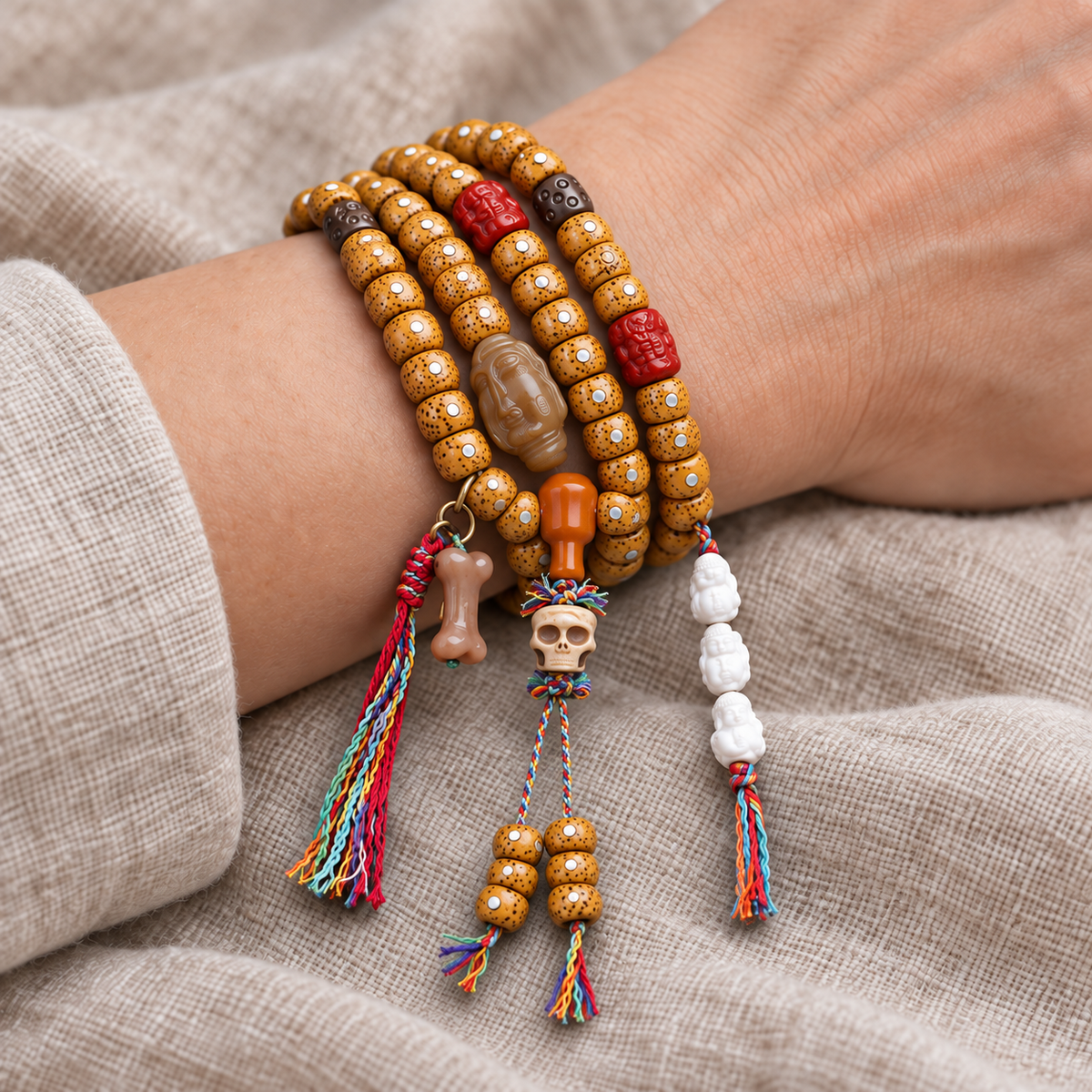EverestArtstudios Xingyue Bodhi 108-Bead Mala with Yak Bone and Red Agate Accents — wrist resting