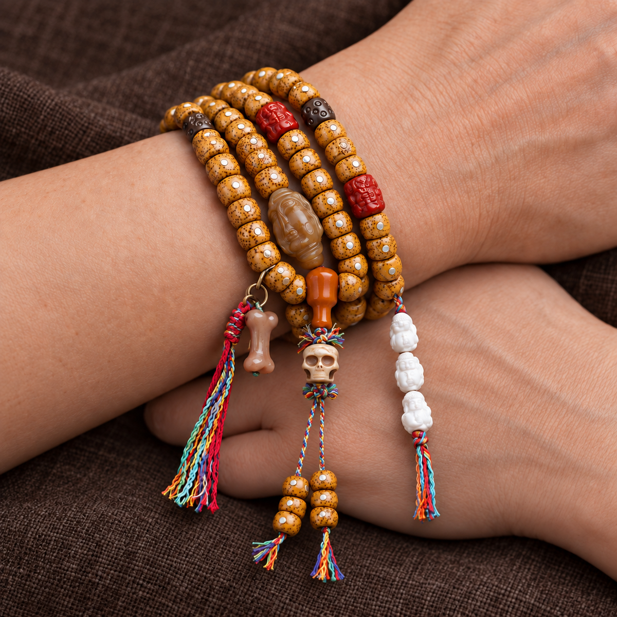 EverestArtstudios Xingyue Bodhi 108-Bead Mala with Yak Bone and Red Agate Accents — wrist crossed
