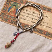 EverestArtstudios Bone 108-Bead Mala with Nine-Eye Motif and Conch Accents — full product