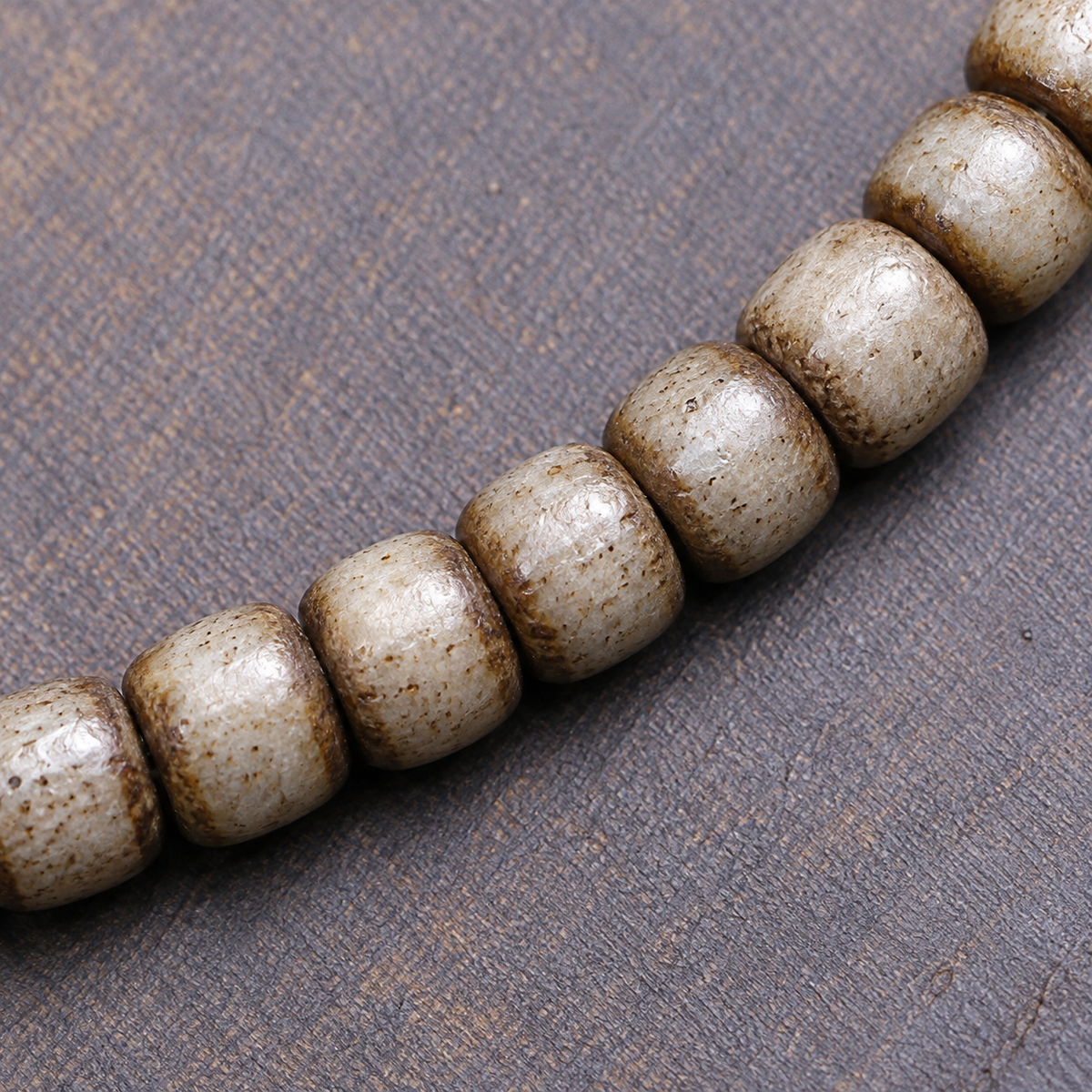 EverestArtstudios Bone 108-Bead Mala with Nine-Eye Motif and Conch Accents — bead detail