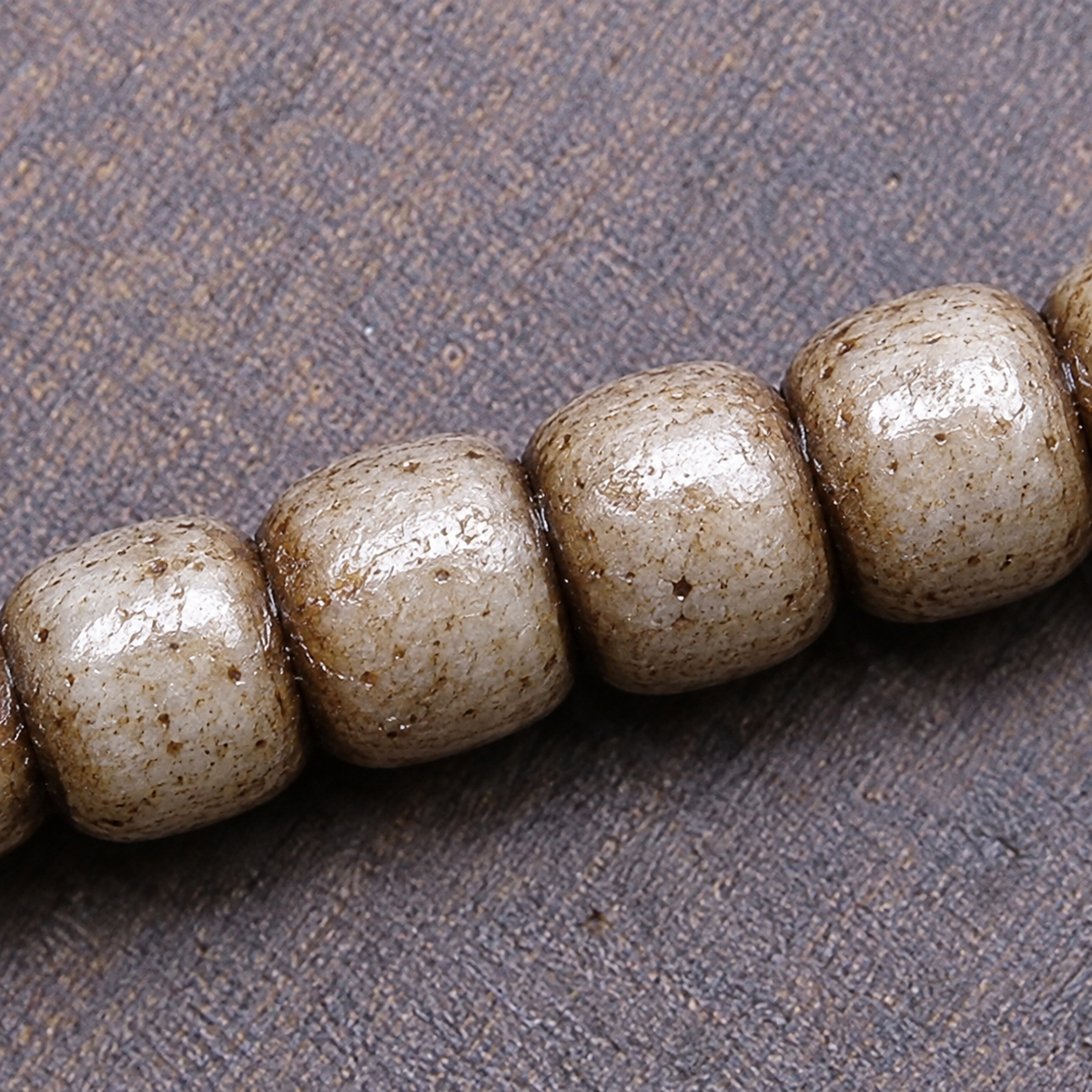 EverestArtstudios Bone 108-Bead Mala with Nine-Eye Motif and Conch Accents — surface detail