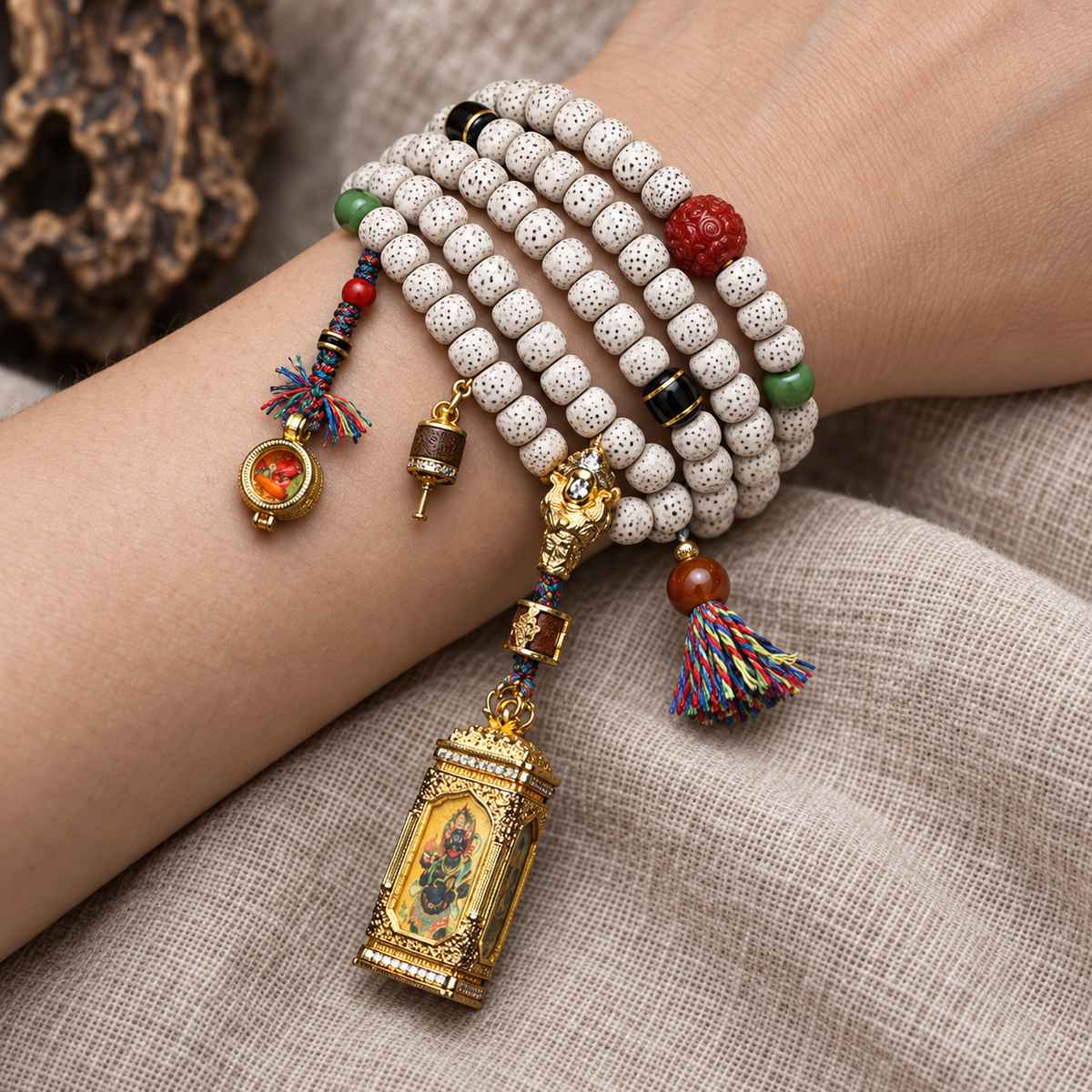 EverestArtstudios Xingyue Bodhi 108-Bead Mala with Four-Sided Thangka and Agate Accents — wrist resting