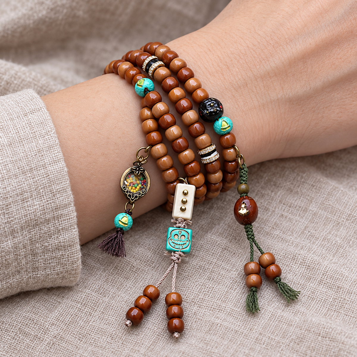 EverestArtstudios 108-Bead Mala with Phoenix Eye Bodhi, Agate and Antler Accents — wrist resting