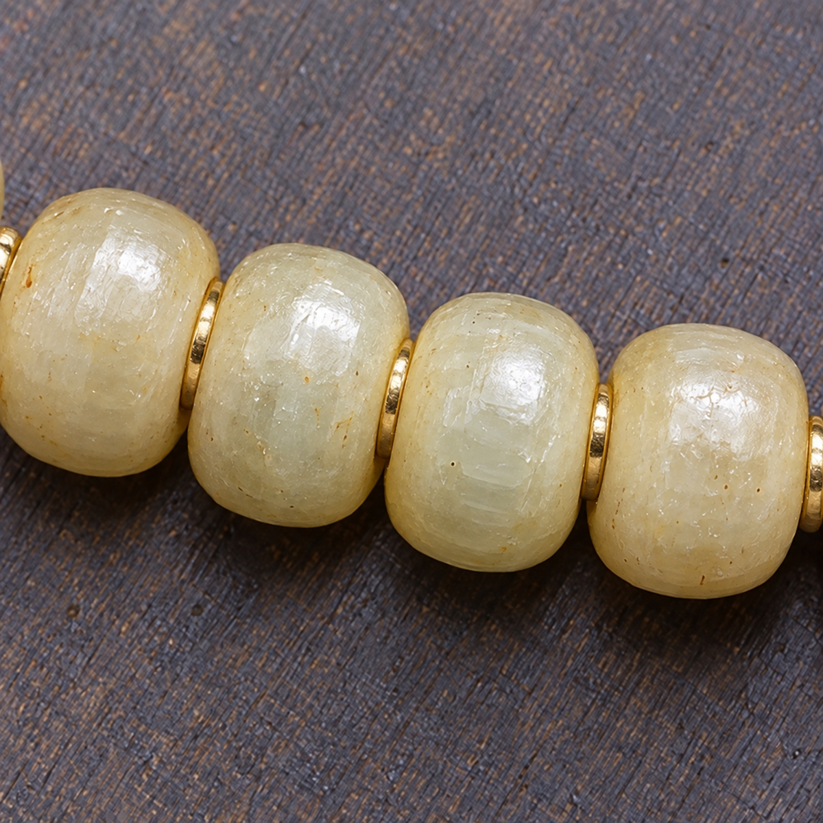 EverestArtstudios Bamboo-Pattern 108-Bead Mala with Carved Charms and Tassels — surface detail