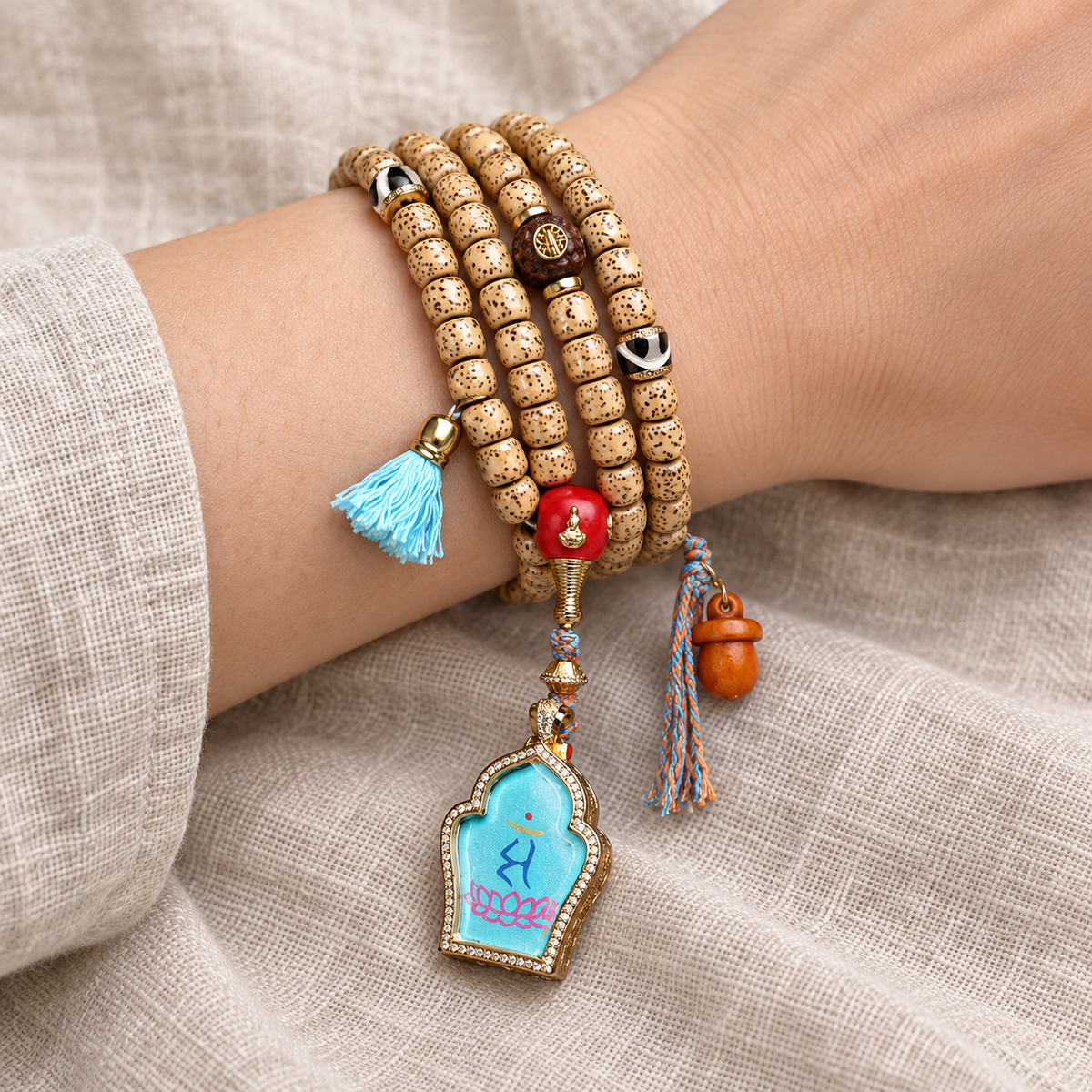 EverestArtstudios Xingyue Bodhi 108-Bead Mala with Manjushri-Inspired Thangka Pendant — wrist resting