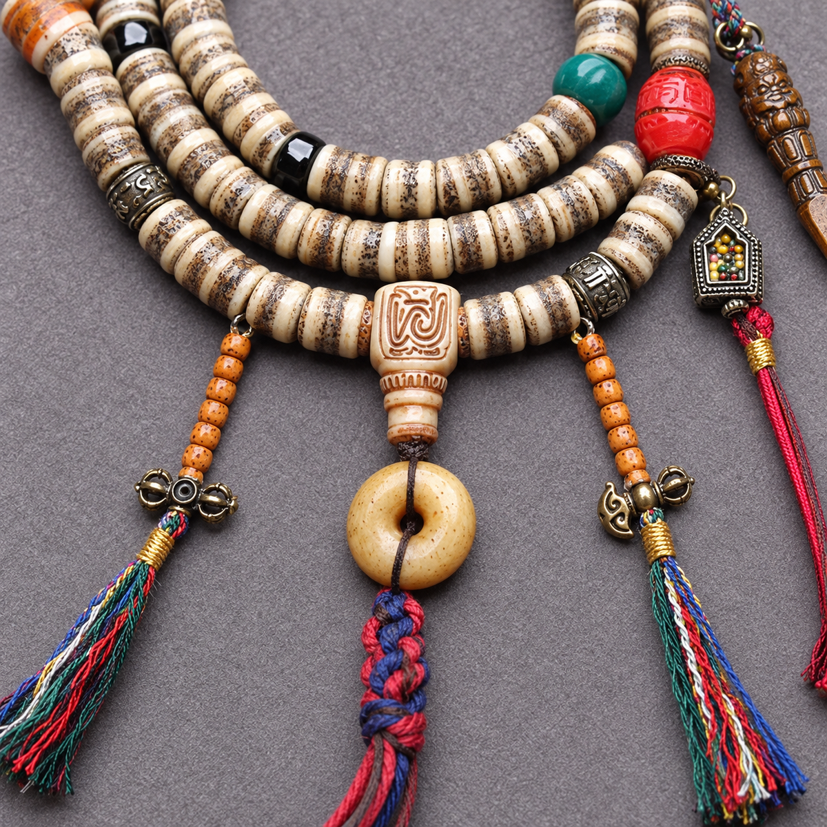 EverestArtstudios 108-Bead Mala with Camel Bone and Ghau Pendant — connection detail